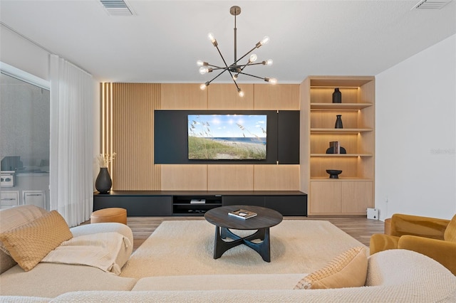 8105 Fenton St, Orlando, FL 32836 - living room with a chandelier, wood finished floors, and built in features
