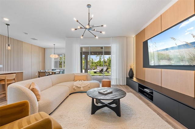 8105 Fenton St, Orlando, FL 32836 - living area with a chandelier and light wood-type flooring