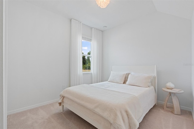 8105 Fenton St, Orlando, FL 32836 - carpeted bedroom with baseboards and lofted ceiling