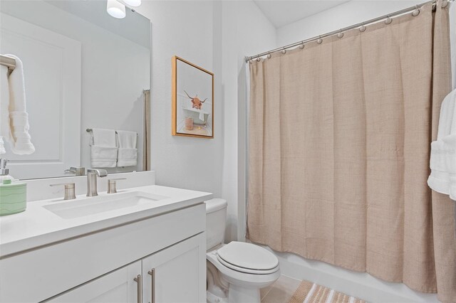 8105 Fenton St, Orlando, FL 32836 - bathroom with toilet, vanity, shower / bath combo with shower curtain, and tile patterned floors