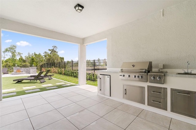 8105 Fenton St, Orlando, FL 32836 - view of patio featuring area for grilling and a sink