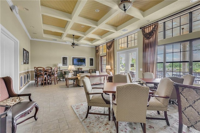 408 Egret Place Dr, Winter Garden, FL 34787 - dining room with coffered ceiling, french doors, a high ceiling, beamed ceiling, and stone tile floors