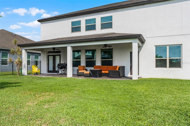 408 Egret Place Dr, Winter Garden, FL 34787 - rear view of house with ceiling fan, an outdoor hangout area, and stucco siding