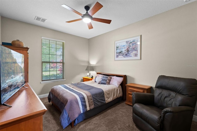408 Egret Place Dr, Winter Garden, FL 34787 - bedroom featuring carpet floors, ceiling fan, baseboards, and a textured ceiling