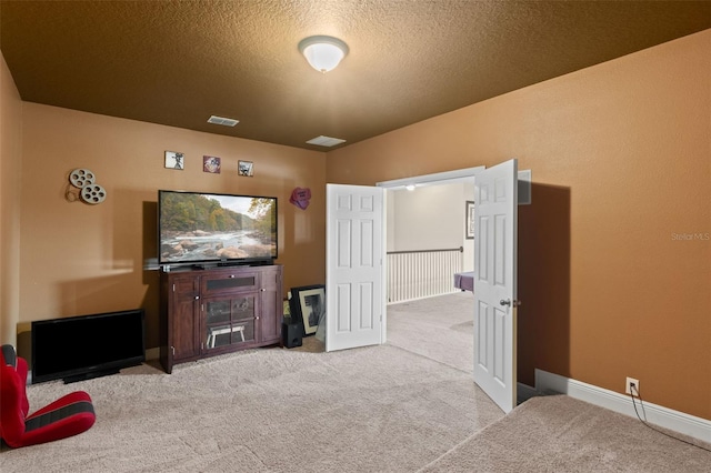 408 Egret Place Dr, Winter Garden, FL 34787 - carpeted living room featuring a textured ceiling and baseboards