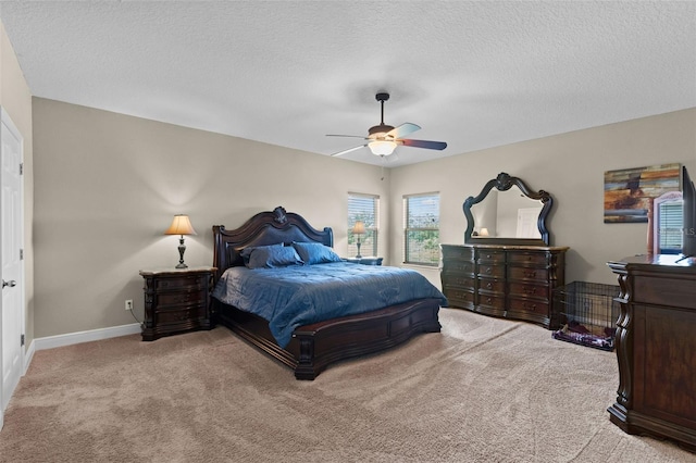 408 Egret Place Dr, Winter Garden, FL 34787 - carpeted bedroom with baseboards, a textured ceiling, and a ceiling fan