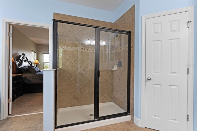 408 Egret Place Dr, Winter Garden, FL 34787 - ensuite bathroom with a stall shower and tile patterned flooring