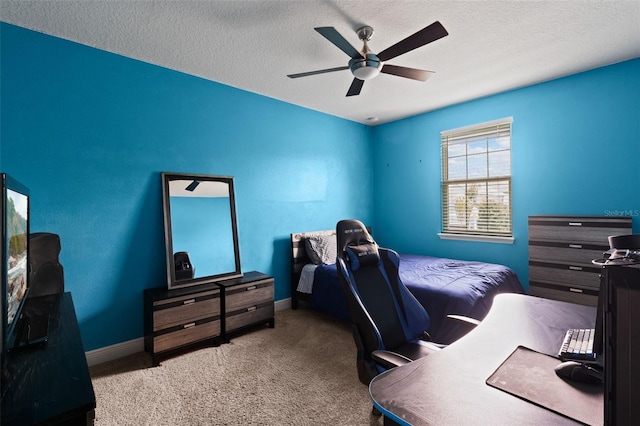 408 Egret Place Dr, Winter Garden, FL 34787 - bedroom with carpet floors, a desk, baseboards, a ceiling fan, and a textured ceiling