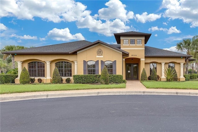 408 Egret Place Dr, Winter Garden, FL 34787 - view of front of home with stucco siding and a front yard