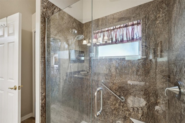 bathroom with a stall shower