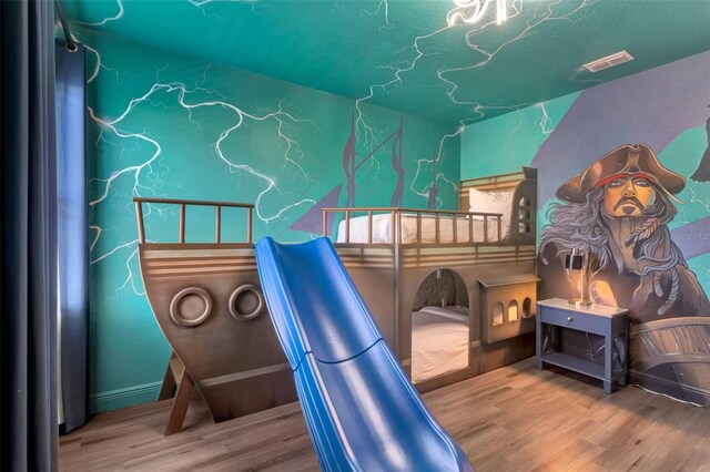 7643 Wilmington Loop, Kissimmee, FL 34747 - bedroom featuring wood finished floors