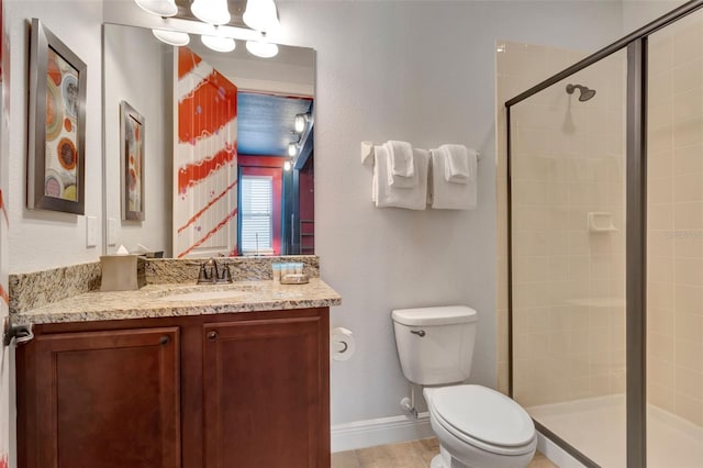 7643 Wilmington Loop, Kissimmee, FL 34747 - bathroom featuring a stall shower, vanity, toilet, and baseboards