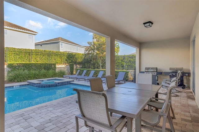 7643 Wilmington Loop, Kissimmee, FL 34747 - view of pool featuring a patio, area for grilling, exterior kitchen, and a fenced backyard
