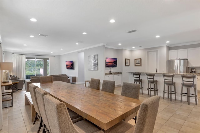 7643 Wilmington Loop, Kissimmee, FL 34747 - dining space with recessed lighting and light tile patterned flooring