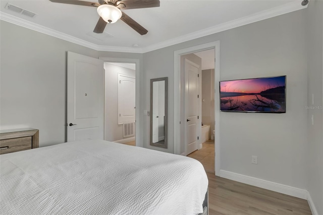 7643 Wilmington Loop, Kissimmee, FL 34747 - bedroom with baseboards, ornamental molding, visible vents, and light wood-type flooring
