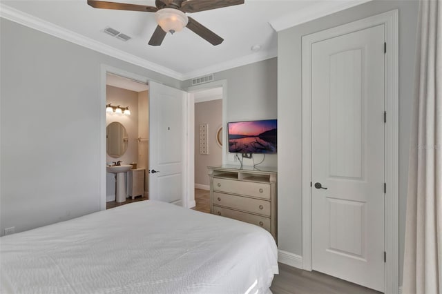 7643 Wilmington Loop, Kissimmee, FL 34747 - bedroom with baseboards, ornamental molding, and visible vents