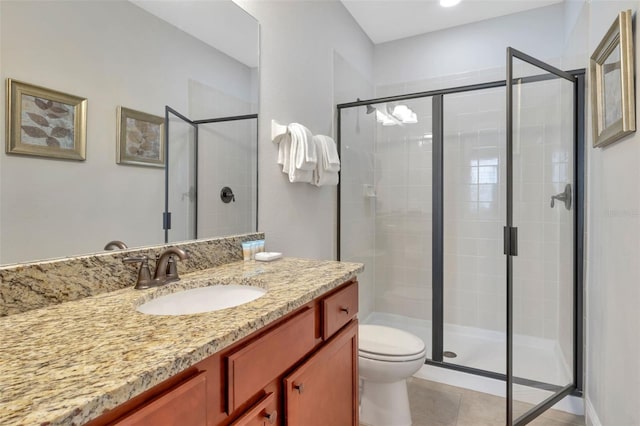 7643 Wilmington Loop, Kissimmee, FL 34747 - bathroom with a shower stall, tile patterned floors, and toilet
