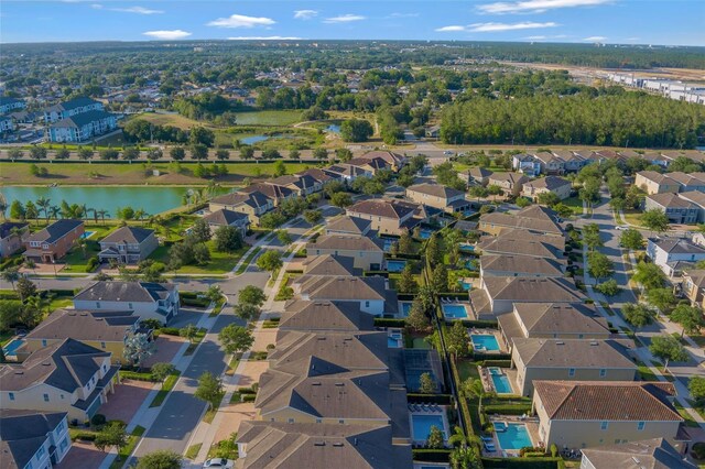 7643 Wilmington Loop, Kissimmee, FL 34747 - bird's eye view featuring a water view and a residential view