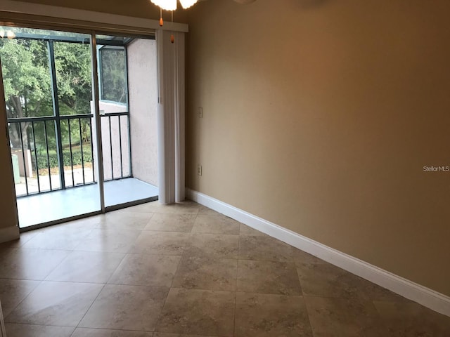 133 Oyster Bay Cir Unit 330, Altamonte Springs, FL 32701 - spare room with baseboards and tile patterned flooring