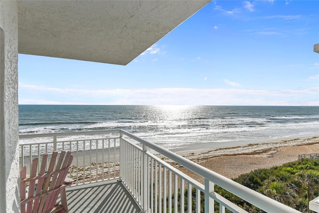 5301 S Atlantic Ave Unit 51, New Smyrna Beach, FL 32169 - balcony featuring a water view and a view of the beach