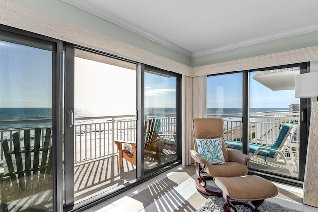 5301 S Atlantic Ave Unit 51, New Smyrna Beach, FL 32169 - sunroom with ornamental molding, a water view, and tile patterned floors