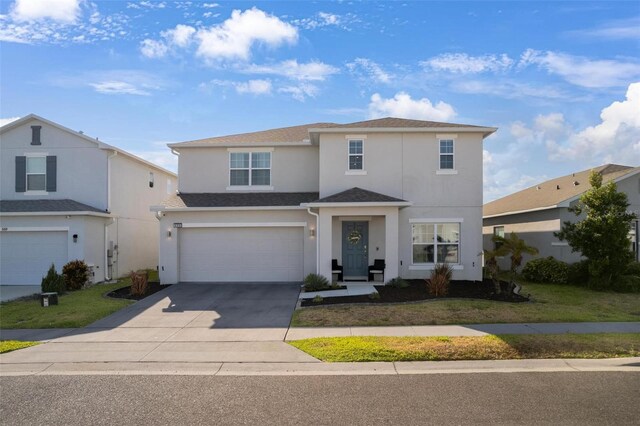 555 Meadow Bend Dr, Davenport, FL 33837 - traditional-style home with stucco siding, concrete driveway, and an attached garage