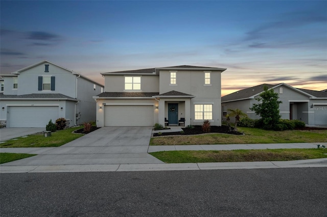 555 Meadow Bend Dr, Davenport, FL 33837 - traditional-style home with stucco siding, a garage, driveway, and a front yard