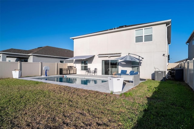 555 Meadow Bend Dr, Davenport, FL 33837 - rear view of property featuring a patio area, stucco siding, and central air condition unit