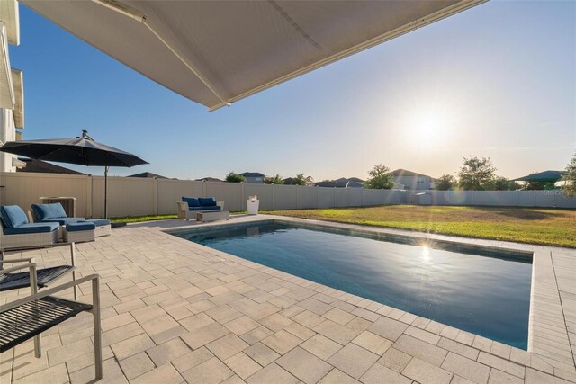 555 Meadow Bend Dr, Davenport, FL 33837 - view of swimming pool featuring a patio and an outdoor hangout area
