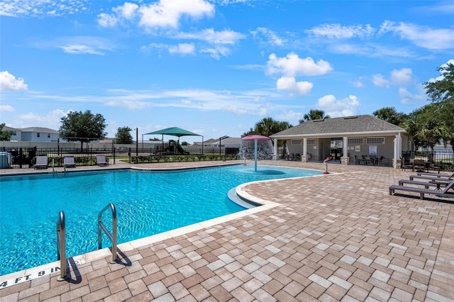 555 Meadow Bend Dr, Davenport, FL 33837 - community pool featuring fence and a patio area