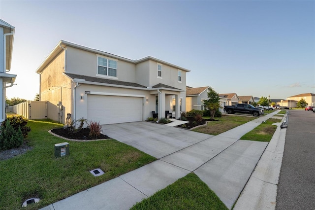 555 Meadow Bend Dr, Davenport, FL 33837 - traditional-style home with stucco siding, a gate, a garage, and concrete driveway