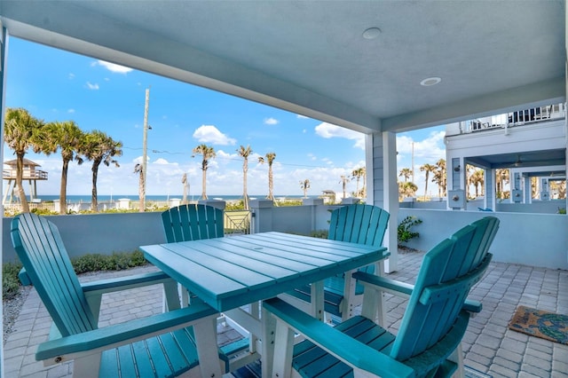 7 Marden Dr, Ormond Beach, FL 32176 - view of patio / terrace with outdoor dining space and a water view