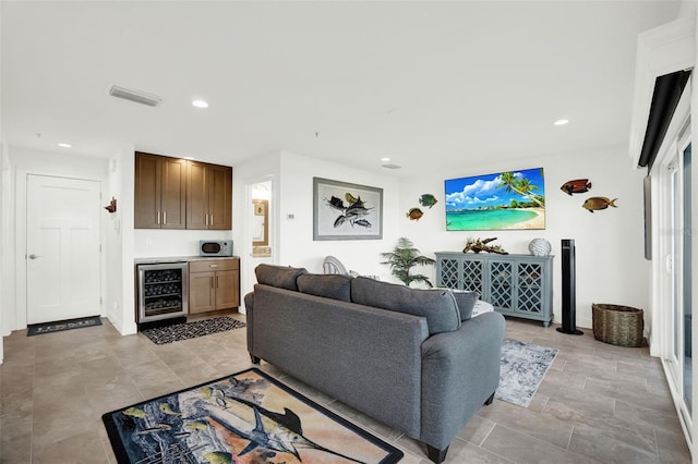 7 Marden Dr, Ormond Beach, FL 32176 - living room featuring wine cooler and recessed lighting