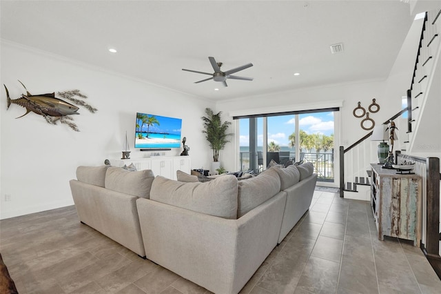 7 Marden Dr, Ormond Beach, FL 32176 - living room with a ceiling fan, stairs, crown molding, and recessed lighting
