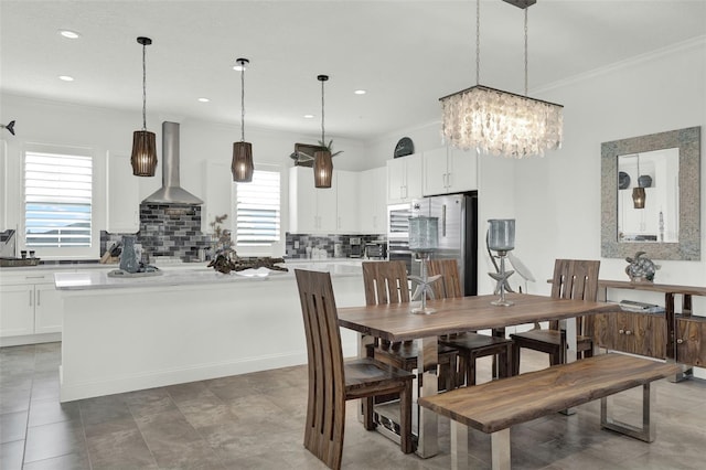 7 Marden Dr, Ormond Beach, FL 32176 - dining room with ornamental molding, a chandelier, and recessed lighting