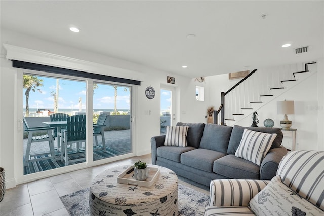 7 Marden Dr, Ormond Beach, FL 32176 - tiled living room with stairs, plenty of natural light, baseboards, and recessed lighting