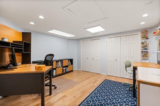 office featuring recessed lighting and light wood finished floors