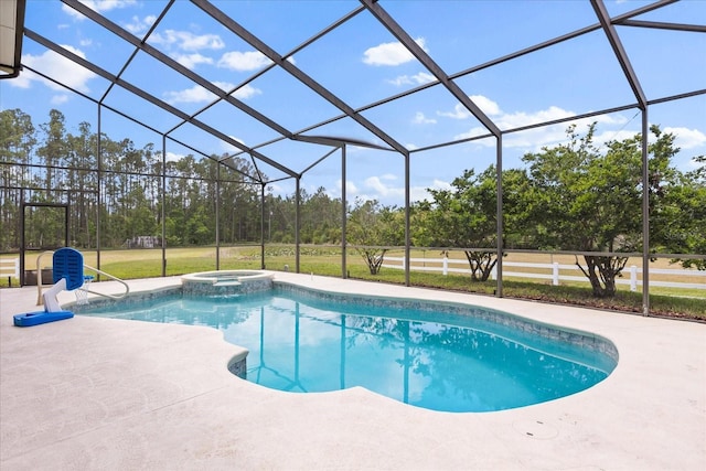 view of pool with a patio, a pool with connected hot tub, and a lanai