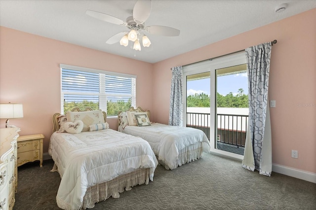 carpeted bedroom with access to outside, baseboards, and a ceiling fan