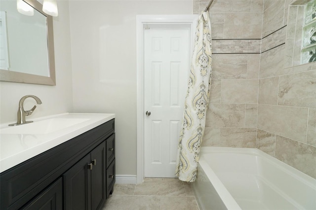 bathroom with vanity, tile patterned flooring, and shower / bath combo