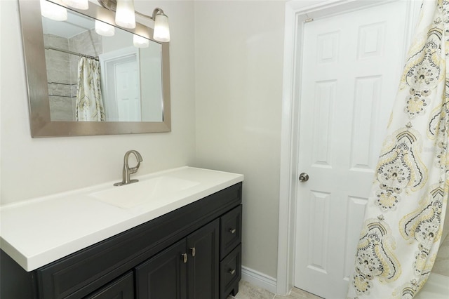 full bathroom with a shower with curtain and vanity
