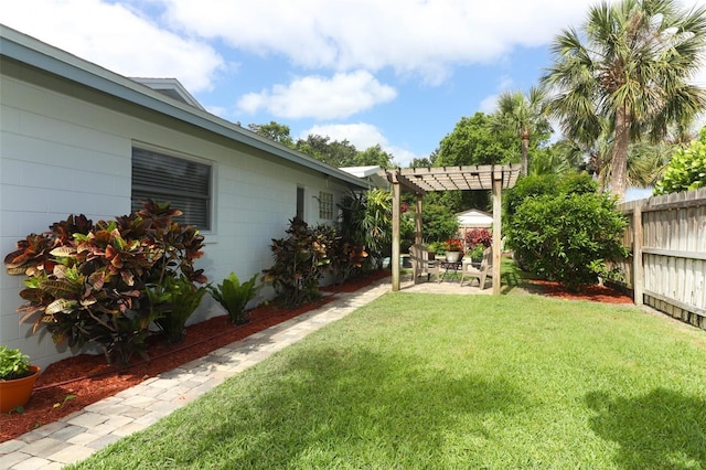 view of yard featuring a fenced backyard, a pergola, and a patio