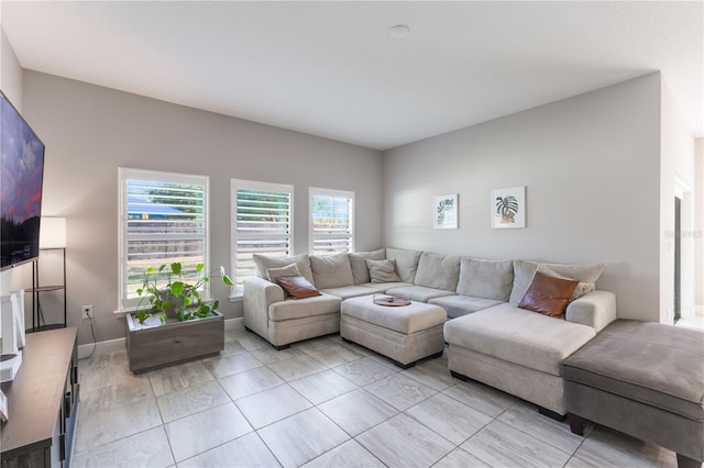 living room featuring baseboards