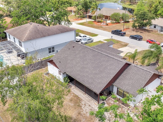 drone / aerial view with a water view