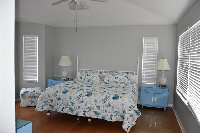 7508 Lake Marsha Dr, Orlando, FL 32819 - bedroom with baseboards, ceiling fan, and dark wood-style floors