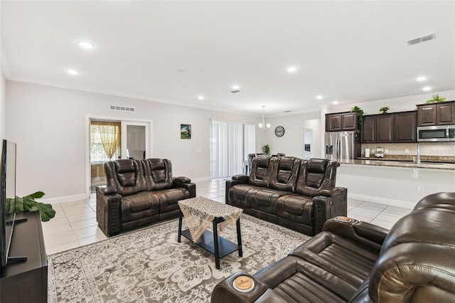 living area featuring visible vents, recessed lighting, and light tile patterned flooring