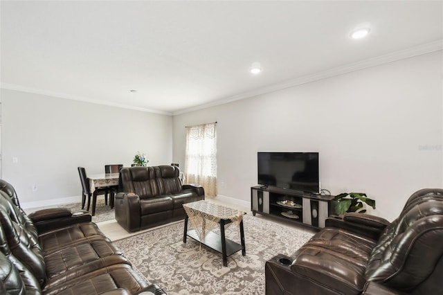 living area with baseboards, recessed lighting, and crown molding