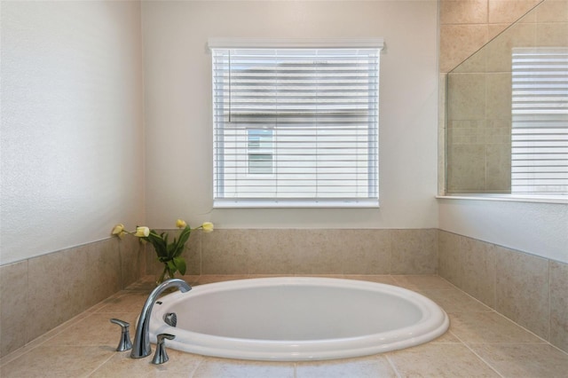 bathroom with a garden tub