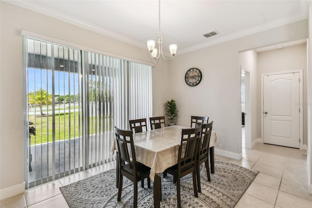 dining area with light tile patterned floors, crown molding, and visible vents