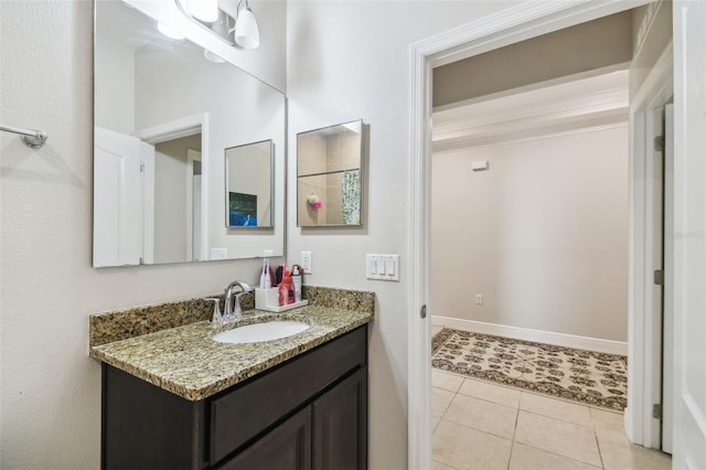 full bath with vanity and tile patterned flooring